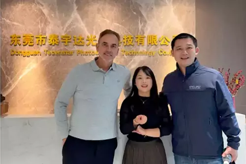 French customer visiting the Victronix display manufacturing facility